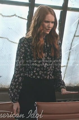 Abby's black floral tie neck blouse on Scandal