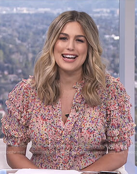 Carissa’s pink floral ruffled blouse on E! News Daily Pop