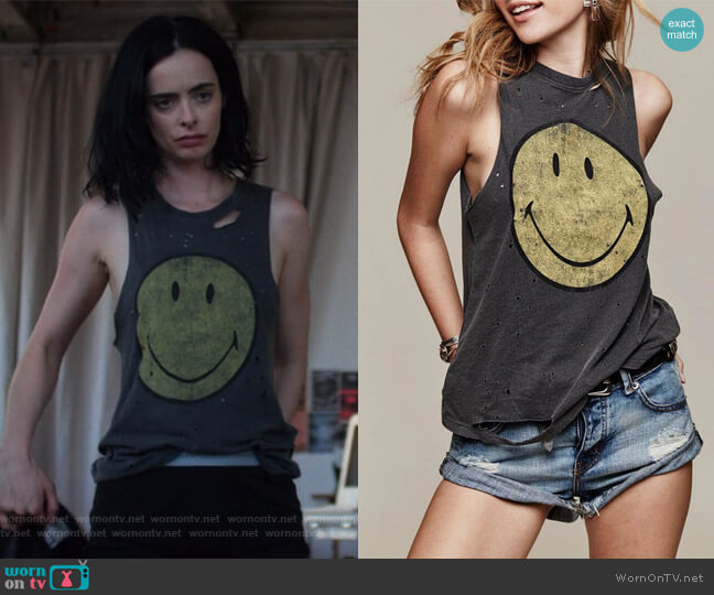 Destroyed Smiley Tank Top by Daydreamer worn by Jessica Jones (Krysten Ritter) on Jessica Jones