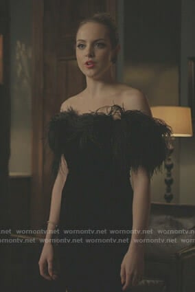 Fallon’s black velvet dress with feather on Dynasty