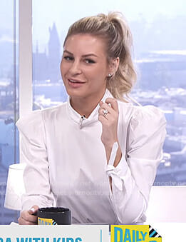 Morgan’s white puff sleeve top with bow cuffs on E! News Daily Pop