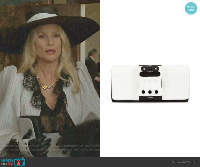 Le Cabriolet Monochrome Leather Clutch by Perrin Paris worn by Alexis Carrington (Elaine Hendrix) on Dynasty