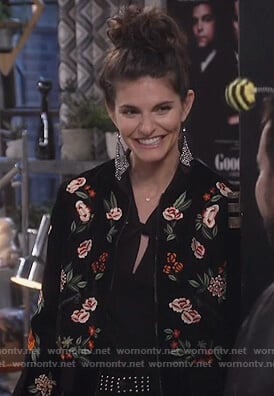 Leslie's black floral bomber jacket and studded pants on Living Biblically