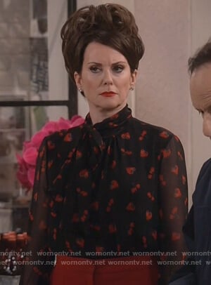 Karen’s black strawberry print blouse on Will and Grace