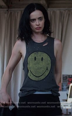 Jessica's distressed smiley face tank top on Jessica Jones