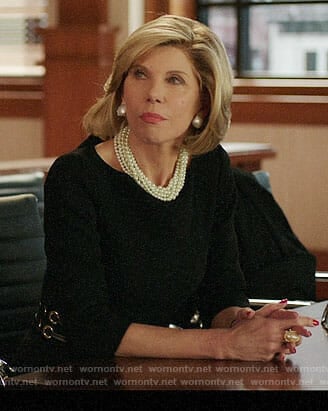 Diane's black dress with grommet waist on The Good Fight