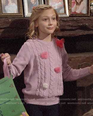Faith's mauve sweater with pom poms on The Young and the Restless