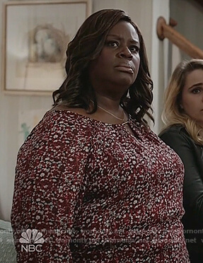 Ruby's red floral print barbell top on Good Girls