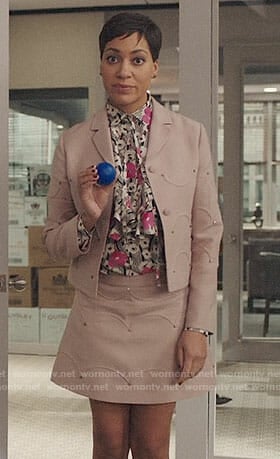 Lucca’s pink studded skirt suit and floral blouse on The Good Fight