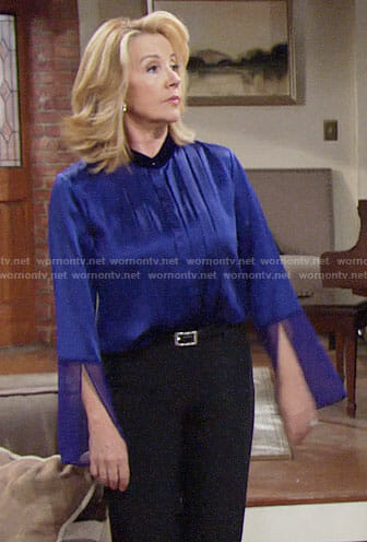Nikki’s blue pleated blouse with bell sleeves on The Young and the Restless