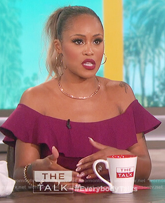 Eve’s purple ruffle off shoulder top on The Talk