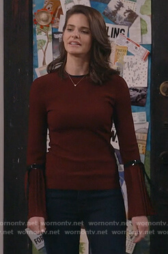 Leslie's red pleated sleeve sweater on Living Biblically