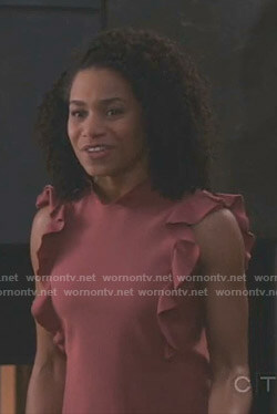 Maggie's pink ruffled top on Grey's Anatomy