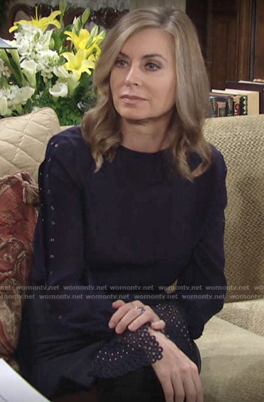 Ashley’s navy blouse with eyelet cuffs on The Young and the Restless