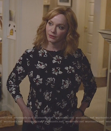 Beth's black floral print long sleeve top on Good Girls