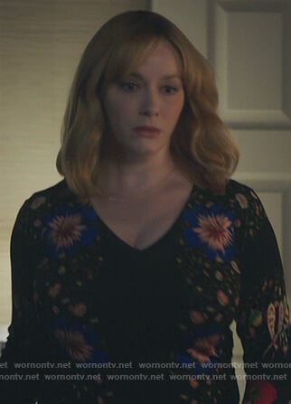 Beth's black v-neck floral print sweater on Good Girls