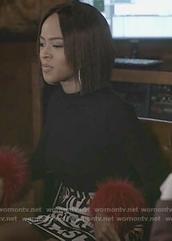 Tiana’s black fur cuff top and print skirt on Empire