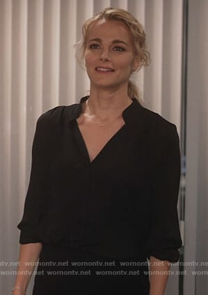 Lizzie’s black v-neck silk blouse on Instinct