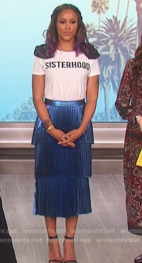 Eve’s white sisterhood t-shirt and pleated blue skirt on The Talk