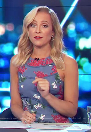 Carrie’s blue sleeveless floral print dress on The Project