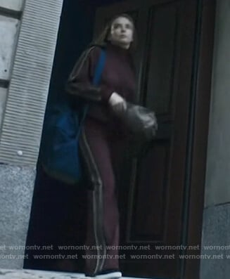 Villanelle’s burgundy striped track jacket and pants on Killing Eve