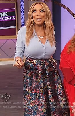 Wendy’s blue cardigan and floral print skirt on The Wendy Williams Show