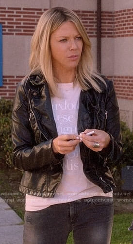 Mickey's blush graphic tee and leather jacket on The Mick