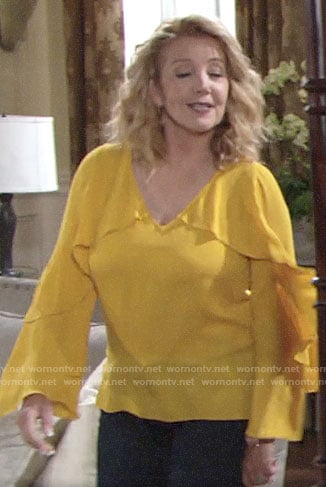 Nikki’s yellow ruffled blouse on The Young and the Restless