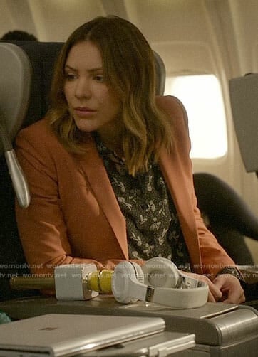 Paige’s floral blouse and coral blazer on Scorpion