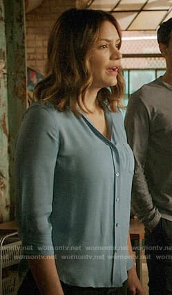 Paige's blue button down blouse on Scorpion