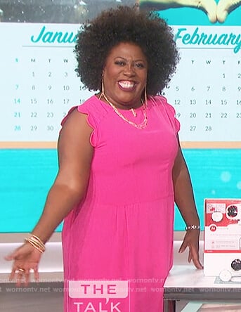 Sheryl’s pink scalloped sleeve dress on The Talk