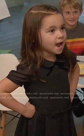 Ruth’s black collared dress with bow on New Girl