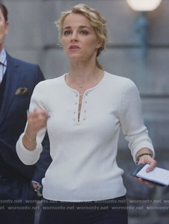 Lizzie’s white barbell embellished sweater on Instinct