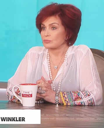 Sharon’s white embellished cuff top on The Talk