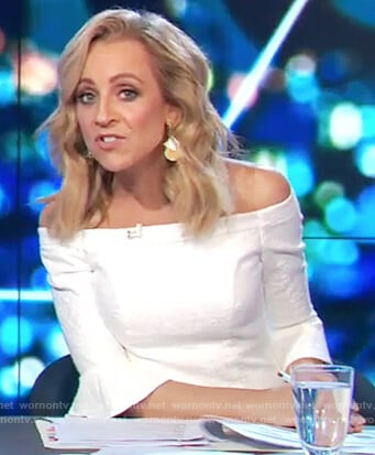 Carrie's white off shoulder dress on The Project