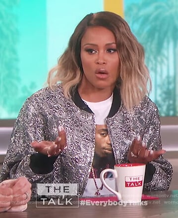 Eve’s white Tupac tee and metallic bomber jacket on The Talk