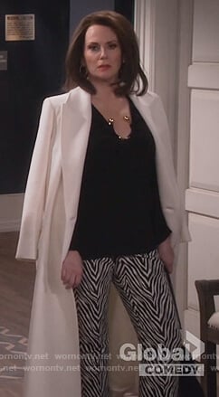 Karen’s black ring embellished top and zebra stripe pants on Will and Grace