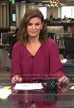 Kristin dos Santos’s pink ruffle sleeve blouse on Live from E!