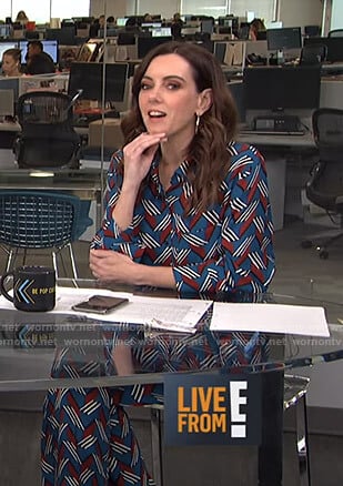 Melanie’s blue geometric print shirt and pants on E! News Daily Pop