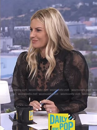 Morgan’s black puff sleeve lace top on E! News Daily Pop