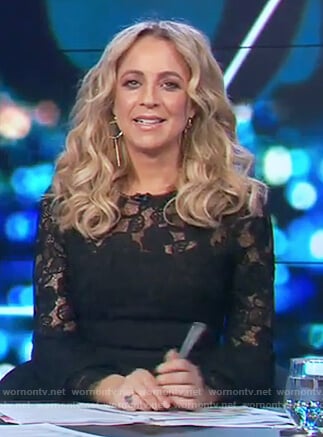 Carrie's black lace bell sleeve dress on The Project