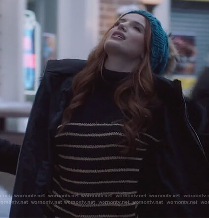 Paige's black striped turtleneck sweater and beanie on Famous in Love