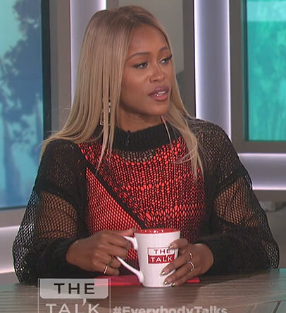 Eve’s black mixed net sweater on The Talk