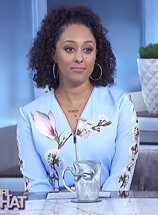 Tamera’s blue floral bomber jacket on The Real