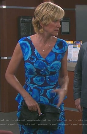 Eve’s blue floral print ruffle sheath dress on Days of our Lives