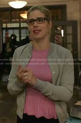 Felicity’s pink ruffled top and grey bomber jacket on Arrow