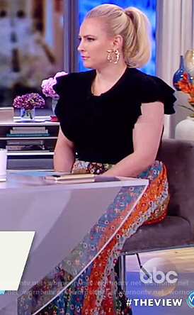 Meghan’s black ruffle sleeve top and floral print maxi skirt on The View