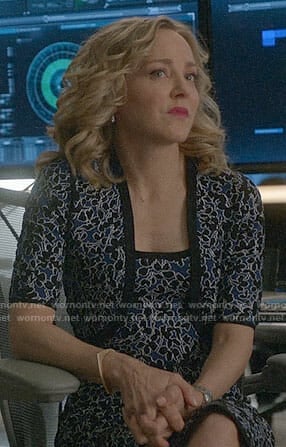 Marissa’s blue floral dress and shrug on Bull