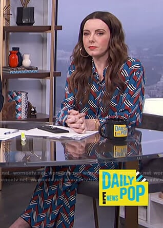 Melanie’s blue geometric print shirt and pants on E! News Daily Pop