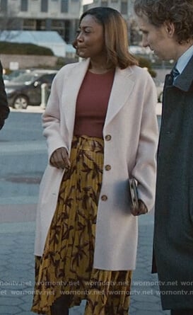 Daisy’s pink coat and leaf printed skirt on Madam Secretary